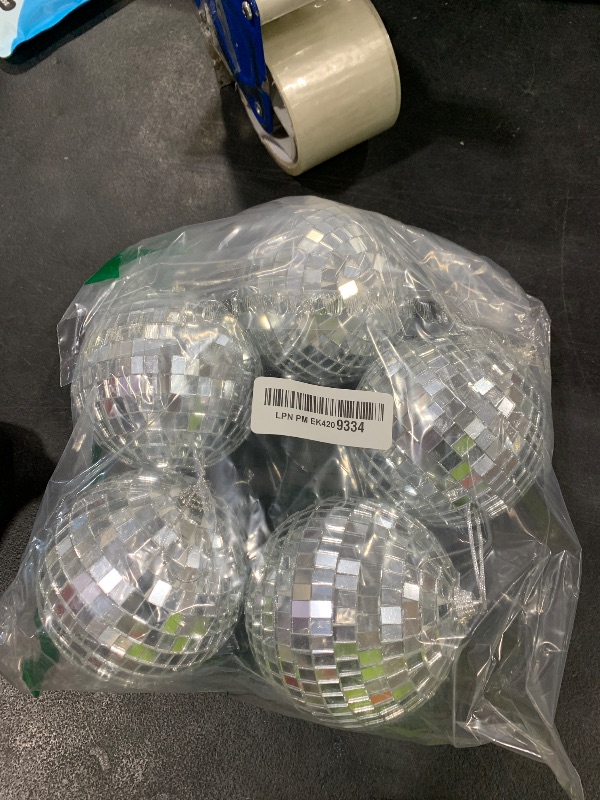 Photo 1 of Suwimut 9 Pack Mirror Disco Ball, 4 Inch Small Reflective Mirror Ball Ornaments Silver Hanging Disco Balls with Attached String for Reflect Light, Party Favor, Home Bands Decorations, Stage Props