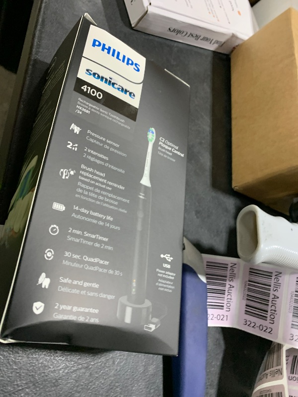 Photo 1 of Philips Sonicare 4100 Rechargeable Electric Toothbrush, with Pressure Sensor, 2 Intensity Settings, SmarTimer and QuadPacer, 14-Day Battery Life, Black, Model HX3681/24