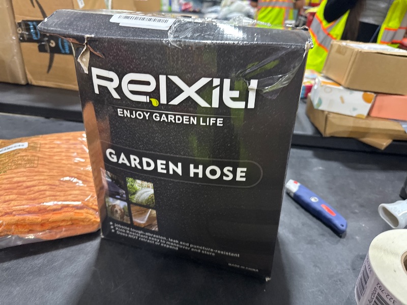 Photo 1 of Non-Expandable Garden Hose 100feet, Flexible Water Hose with 10 Function Hose Nozzle, Lightweight, Tangle Free, Rust Proof for Yard (Black)