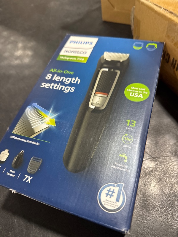 Photo 1 of Norelco Philips Multi Groomer - 13 Piece Mens Grooming Kit for Beard, face, Nose, and Ear Hair Trimmer and Hair Clipper - NO Blade Oil Needed, MG3740/40