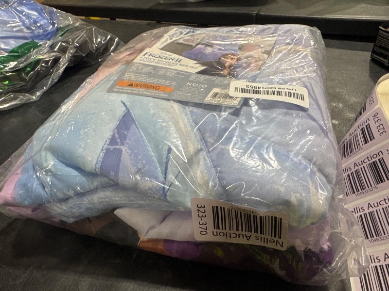 Photo 1 of Disney Frozen 2 Lavender, Light Blue and Purple Forest Spirit 4 Piece Toddler Bed Set - Comforter, Fitted Bottom Sheet, Flat Top Sheet, Reversible Pillowcase