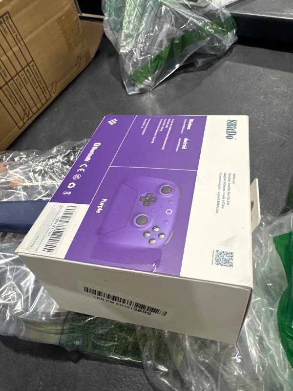 Photo 1 of 8Bitdo Ultimate 2 Wireless Gaming Controller with TMR Joysticks, Switchable Hall Effect/Tactile Triggers, 8Speed Wireless Tech, Charging Dock, RGB Fire Ring for PC & Android - Purper