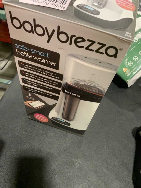 Photo 1 of Baby Brezza Smart Baby Bottle Warmer, Breastmilk Warmer + Defroster – Free App - Only Brand with Different Temperatures for Breastmilk + Formula - Universal Fit for All Bottles + Milk Bags