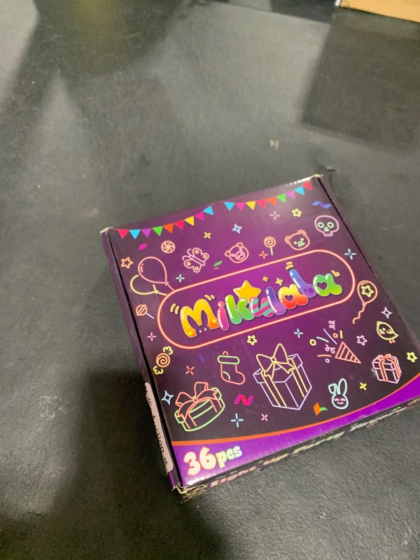 Photo 1 of Mikulala 36 Pack Light Up Rings Glow in The Dark Party Supplies, Light up Party Favors, Goodie Bag Stuffers, Birthday Christmas Party Favors Classroom Prizes Cute Animal Treasure Box for Kids