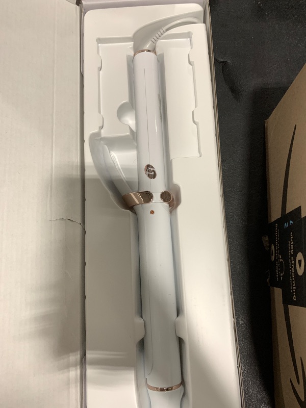 Photo 1 of T3 SinglePass Curl X Extra-Long Barrel Curling Iron with 9 Heat Settings and Ceramic Barrel for Fast Styling and Lasting Results on All Hair Types