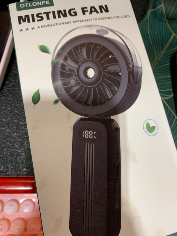 Photo 1 of Otlonpe Handheld Misting Fan Portable, Powerful High Speed, Small Personal Rechargeable Cooling Mister Fan Water Spray Mist, 4000mAh Battery Operated for Travel Indoor Outdoor Hand Desk (Black)