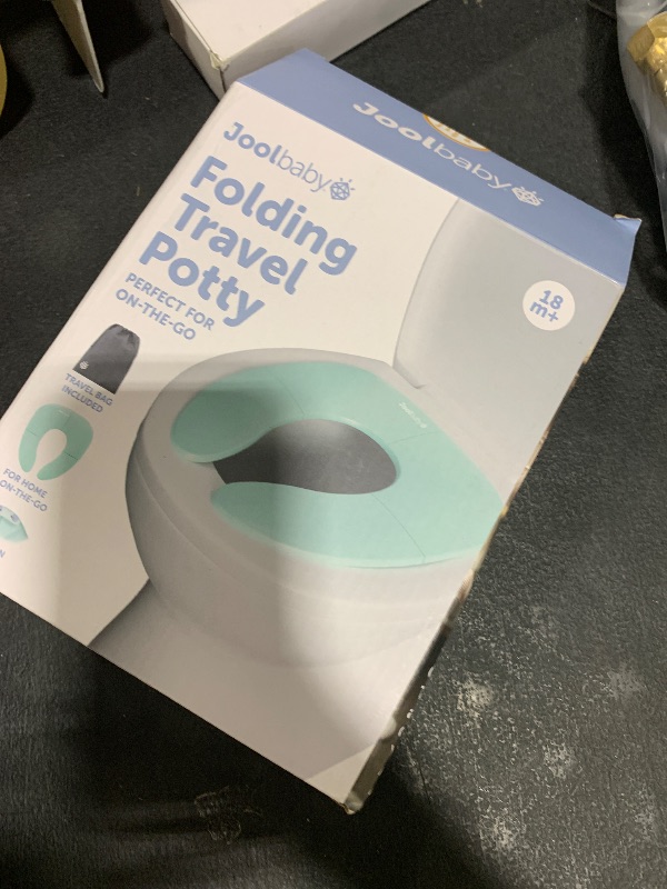 Photo 1 of Jool Baby Folding Travel Potty Training Seat for Toddlers, Fits Round & Oval Toilets, Non-Slip Suction Cups, Includes Free Travel Bag (Aqua)