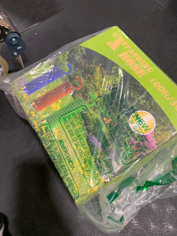 Photo 1 of 100 ft Expandable Garden Hose with 10 Patterns Nozzle,Kink-free, Flexible Expanding Water Hoses with 3/4" Solid Fittings and 4-Layer Latex Core - Garden Hoses