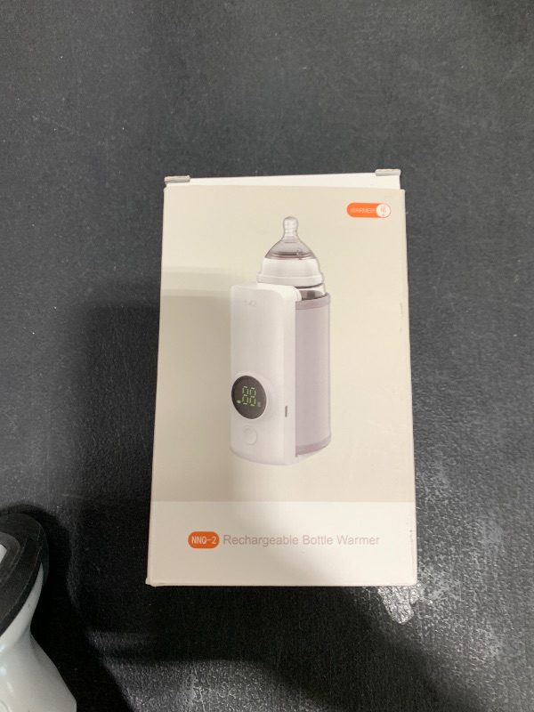 Photo 1 of Portable Bottle Warmer for Travel, Rapid Warming with Battery-Powered Temperature Display, Waterless Milk Warming for Comfortable Baby Feeding On The Go