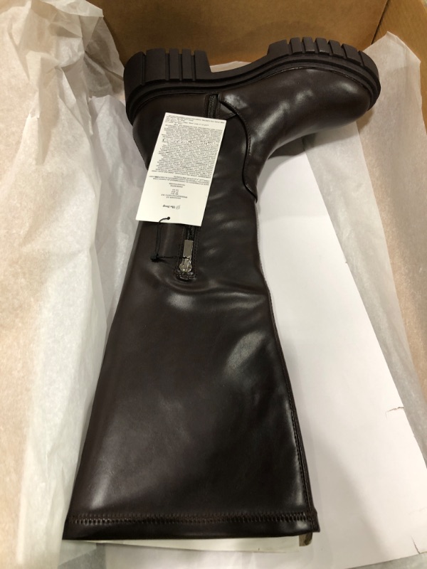 Photo 1 of BROWN BOOTS 
SIZE 8.5 WMS