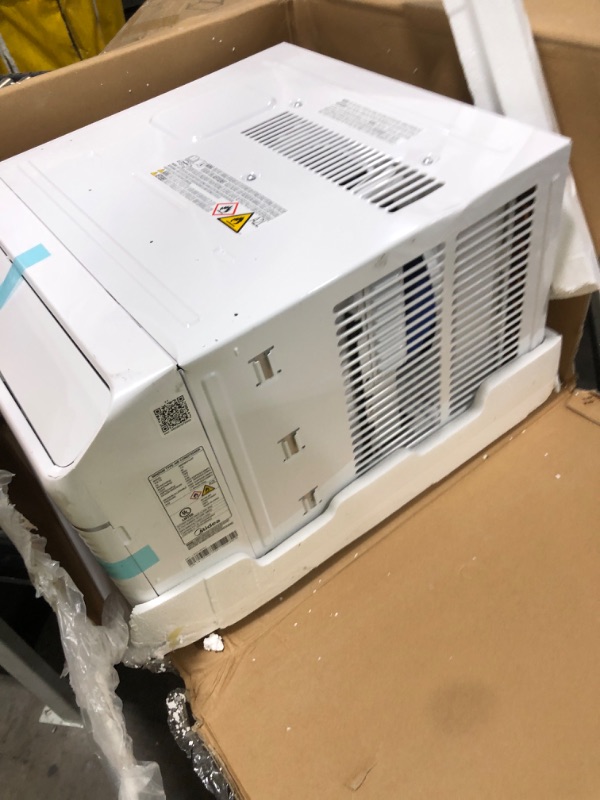 Photo 1 of Midea 8,000 BTU Smart Inverter Air Conditioner Window Unit with Heat and Dehumidifier – Cools up to 350 Sq. Ft., Energy Star Rated, Quiet Operation, Electronic Controls, Remote Control, White
