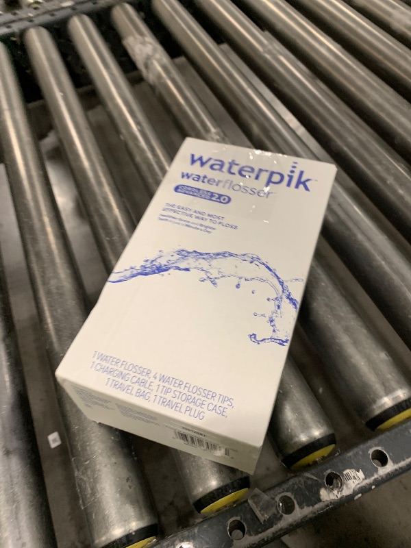 Photo 1 of Waterpik Cordless Advanced 2.0 Water Flosser For Teeth, Gums, Braces, Dental Care With Travel Bag and 4 Tips, ADA Accepted, Rechargeable, Portable, and Waterproof, White WP-580, Packaging May Vary