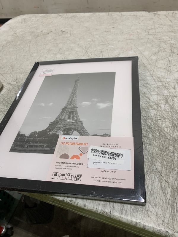 Photo 1 of upsimples 11x14 Picture Frame, Display Pictures 8x10 with Mat or 11x14 Without Mat, Wall Hanging Photo Frame, Black, 1 Pack