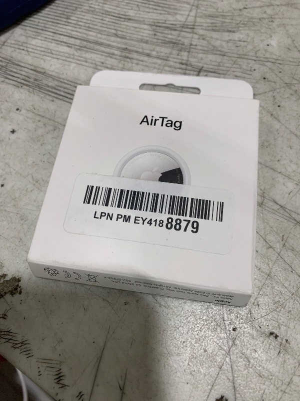 Photo 1 of Apple AirTag. Keep Track of and find Your Keys, Wallet, Luggage, Backpack, and More. Simple one-tap Set up with iPhone or iPad