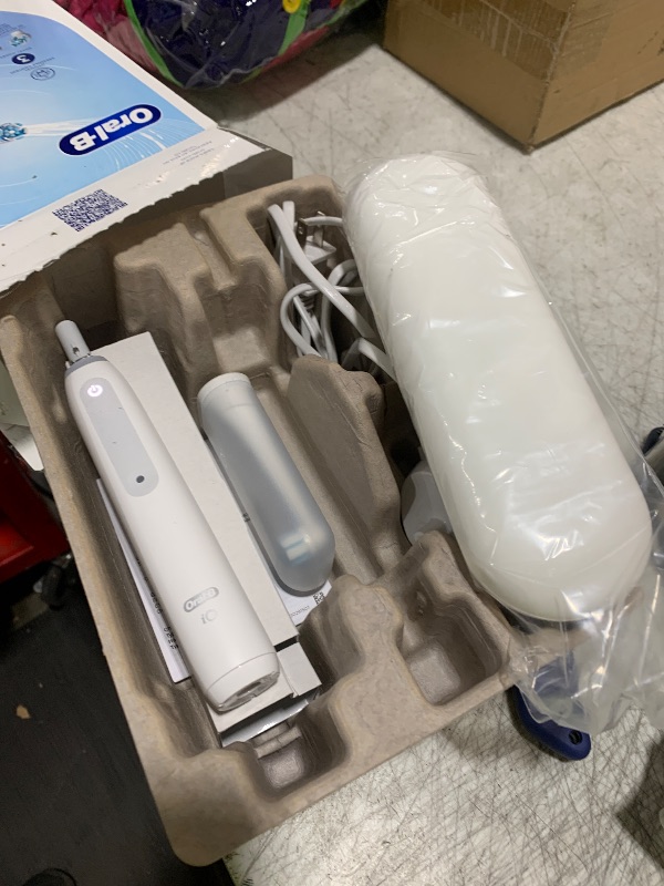 Photo 1 of Oral-B iO Deep Clean Rechargeable Electric Powered Toothbrush, White with iO Series 3 Limited, 2 Brush Heads and Travel Case - Pressure Sensor to Protect Gums - 3 Cleaning Settings - 2 Minute Timer