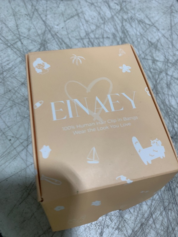 Photo 1 of EINAEY Clip in Bangs, 100% Real Human Hair Ash Blonde Fake Bangs Hairpieces for Women Fringe with Temples Wispy Bangs Clip In Hair Extensions for Daily Wear