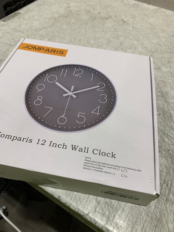 Photo 1 of jomparis Wall Clock 12 Inch Non-Ticking Silent Battery Operated Round Wall Clock Modern Simple Style Decor Clock for Home/Office/School/Kitchen/Bedroom/Living Room