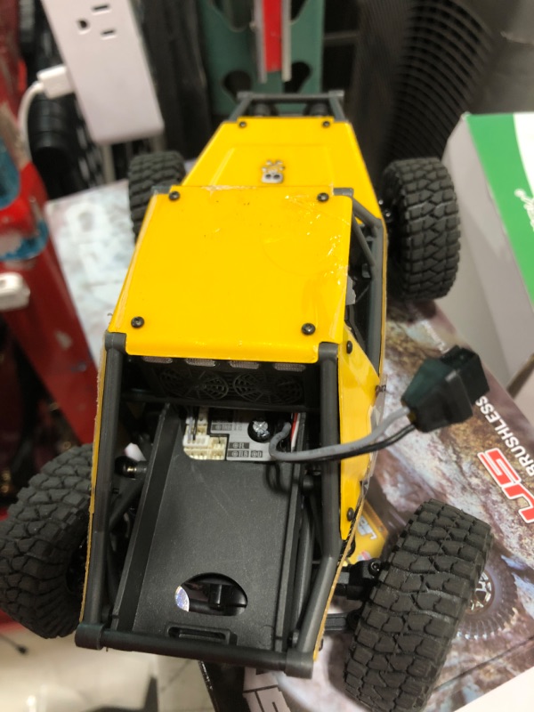 Photo 1 of wheelfun 1/24 4x4 UDI RC UCX2405PRO RC Rock Crawler Model Brushless Motor ESC Radio Controlled Off-Road Vehicles RTR Car Battery(Yellow)