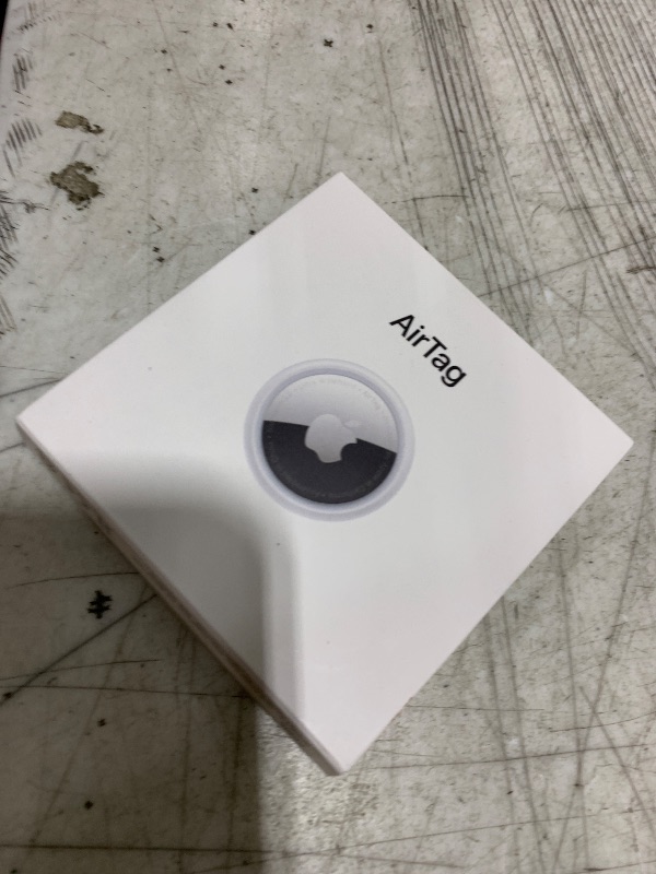 Photo 1 of Apple AirTag. Keep Track of and find Your Keys, Wallet, Luggage, Backpack, and More. Simple one-tap Set up with iPhone or iPad