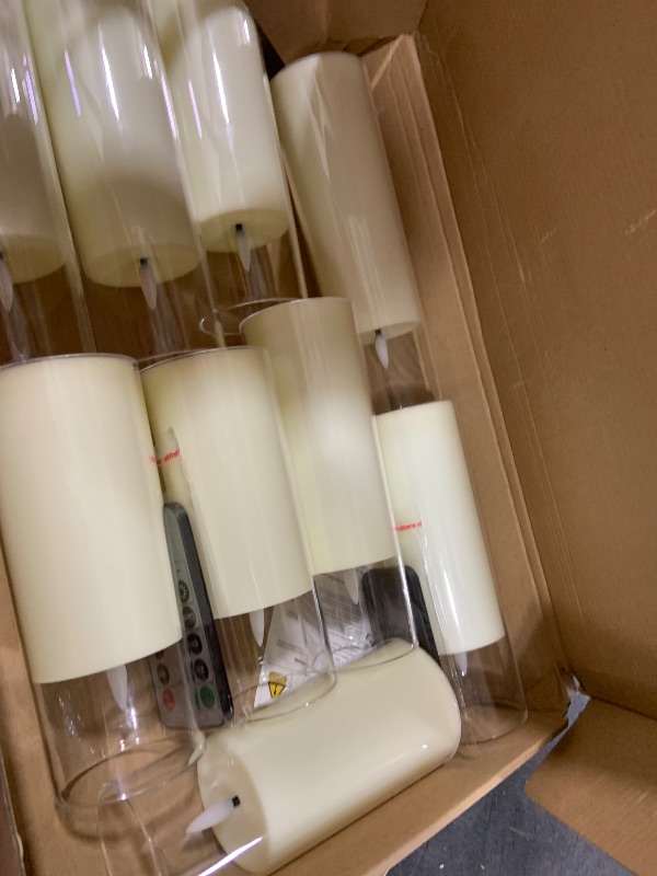 Photo 1 of kakoya Flickering Flameless Candles Battery Operated with Remote and 2/4/6/8 H Timer Plexiglass Led Pillar Candles Pack of 9 (D2.2"xH 5"6"7")with Realistic Moving Wick Candles for Home Decor(Ivory)