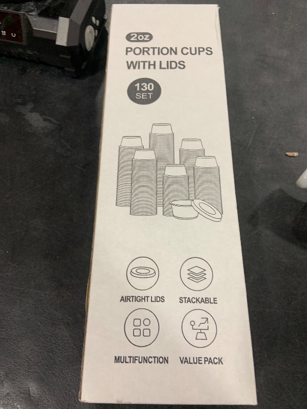 Photo 1 of 2oz Portion Cups with Lids in a 130-set value pack.