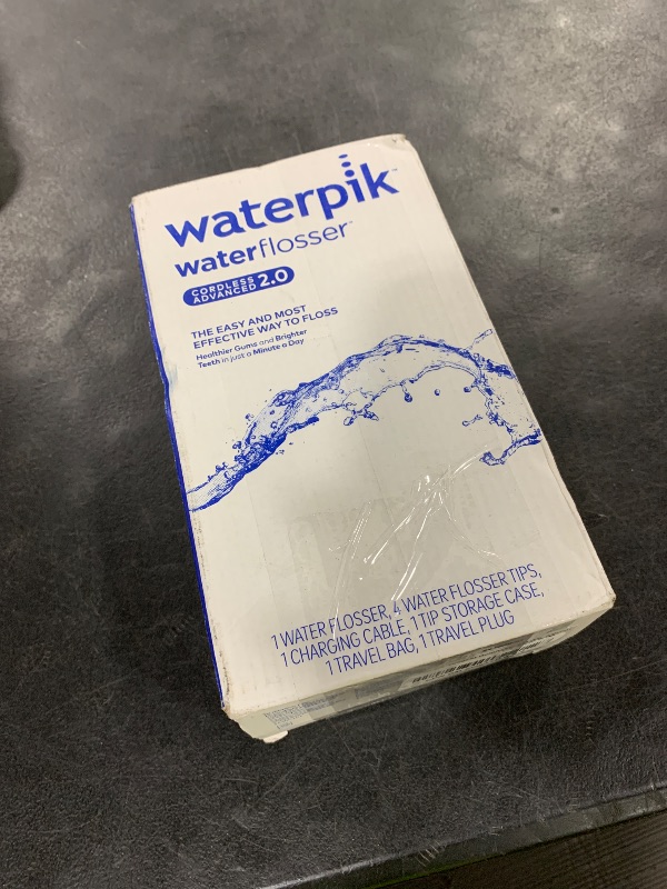 Photo 1 of Waterpik Cordless Advanced 2.0 Water Flosser For Teeth, Gums, Braces, Dental Care With Travel Bag and 4 Tips, ADA Accepted, Rechargeable, Portable, and Waterproof, White WP-580, Packaging May Vary