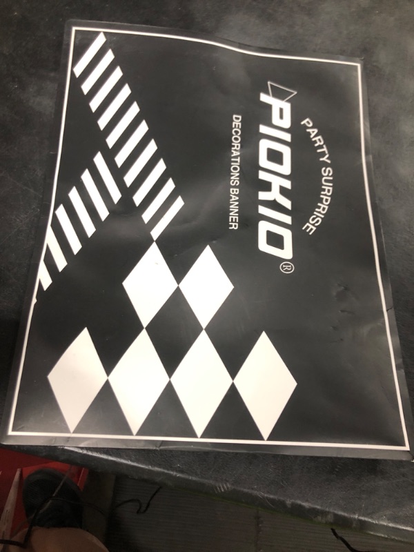 Photo 1 of Piokio Double Sided Plastic Checkered Flag Banner, Racing Birthday Decorations, for Nascar Cars Party Supplies