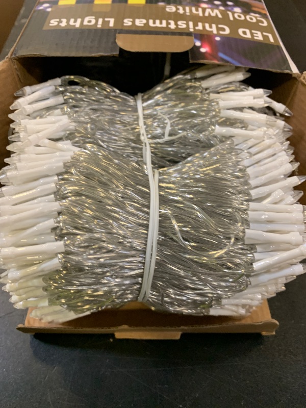 Photo 1 of 1500 LED 470FT Christmas String Lights, 12 Modes and Timer Memory Dimmable, Plug in Outdoor Waterproof Clear Wire Twinkle Fairy Light for for Xmas Yard Tree Wedding Party Outside Decor (Cool White)