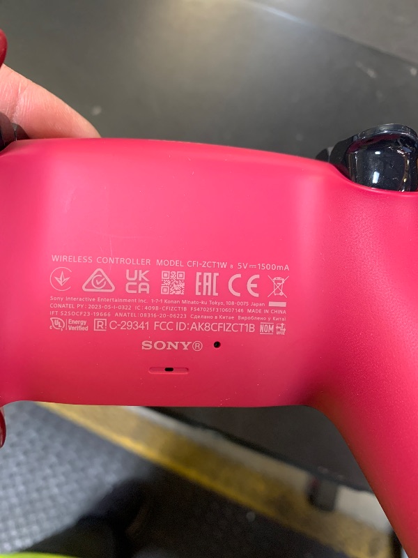 Photo 4 of PlayStation DualSense Wireless Controller - Cosmic Red (Renewed Premium)