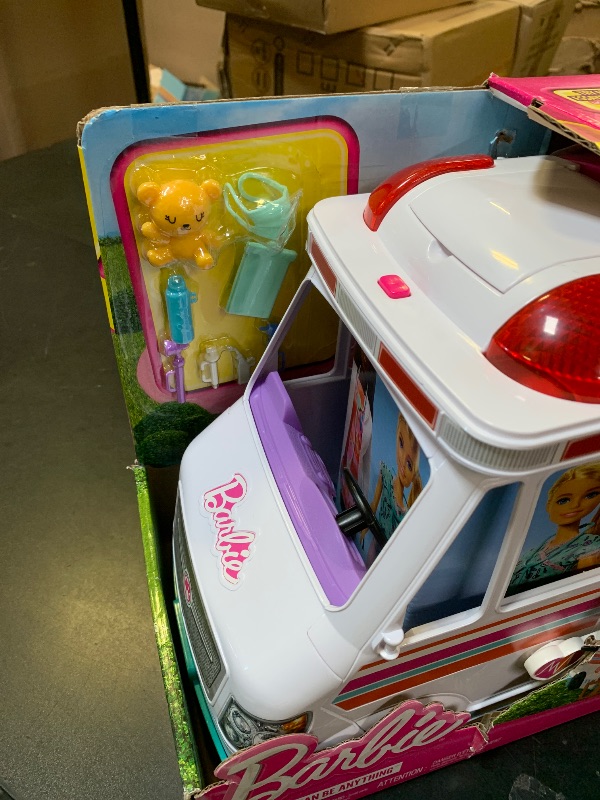 Photo 1 of ???Barbie Playset with 20+ Accessories, Emergency Vehi??cle Transforms into 2+ Foot Hospital with Lights and Sounds, Care Clinic????????