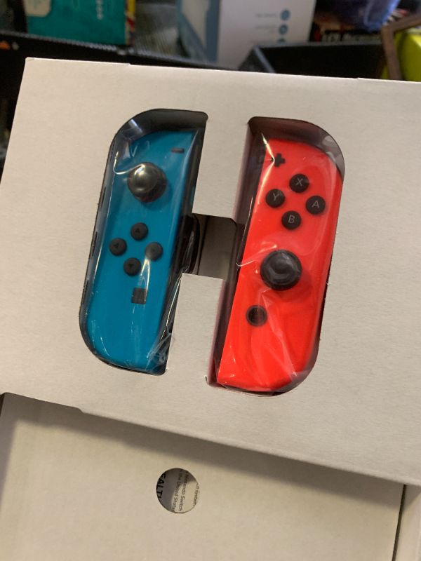 Photo 1 of Nintendo Switch™ with Neon Blue and Neon Red Joy?Con™