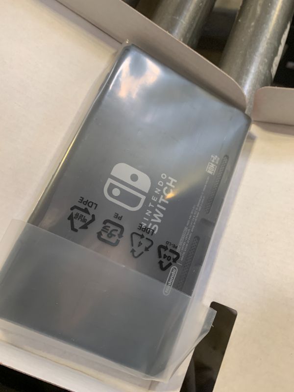 Photo 1 of Nintendo Switch™ with Neon Blue and Neon Red Joy?Con™