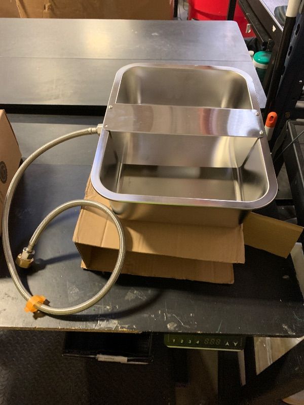 Photo 1 of *POSSIBLE*automatic waterer bowl, designed for pets or livestock. It features a float valve mechanism to automatically refill the bowl when the water level drops and a hose connection for a continuous water supply. 