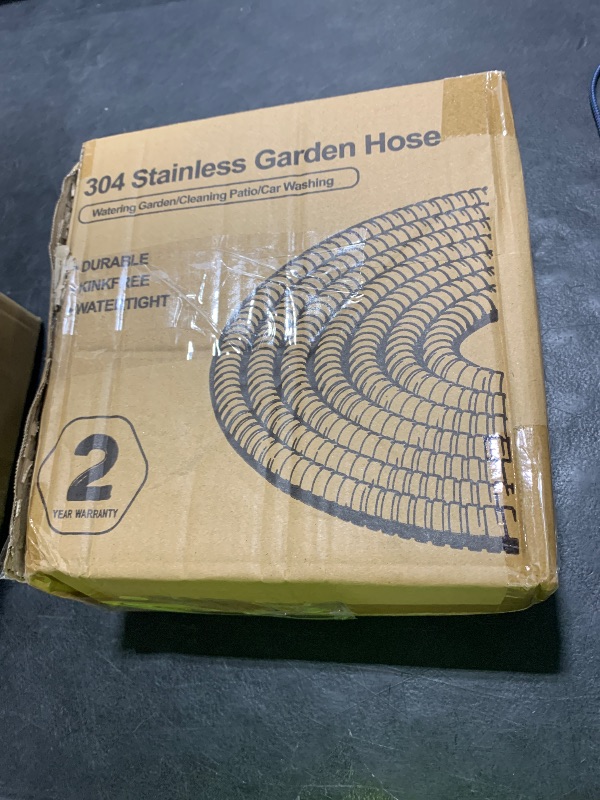 Photo 1 of SPECILITE 50ft 304 Stainless Steel Garden Hose Metal, Heavy Duty Water Pipe with Nozzles for Yard, Outdoor - Flexible, Never Kink & Tangle, Puncture Resistant (Sliver)