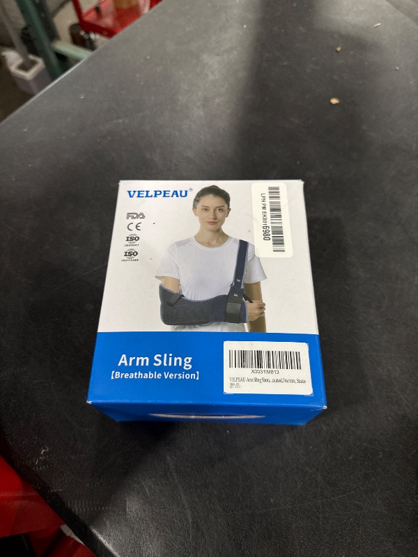Photo 1 of VELPEAU Arm Sling Shoulder Immobilizer for Women and Men, fit Left or Right Arm -Rotator Cuff Support Brace -Medical Sling for Shoulder, Clavicle, Elbow Injury (Breathable type, Medium: Bust 29.5?-33.5?)