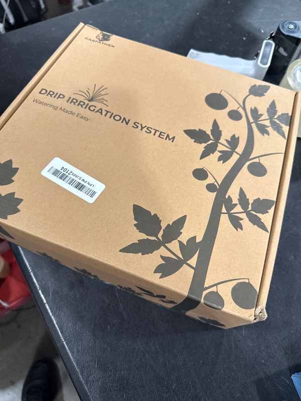 Photo 1 of CARPATHEN Drip Irrigation System - Adjustable Premium Irrigation System for Garden, Raised Beds - Complete Drip Irrigation Kit with Drip Emitters, 5/16" and 1/4" Irrigation Tubing and Barbed Fittings