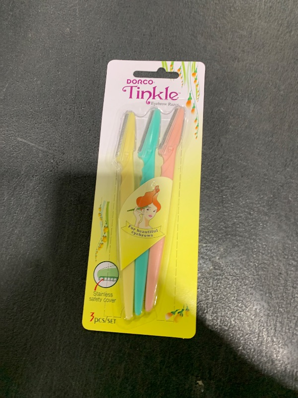 Photo 1 of Tinkle Dermaplaning Tool 12ct, Dermaplane Razor for Women, Safe and Easy Peach Fuzz Remover, Eyebrow Trimmer with Protective Cover (1 PACK)