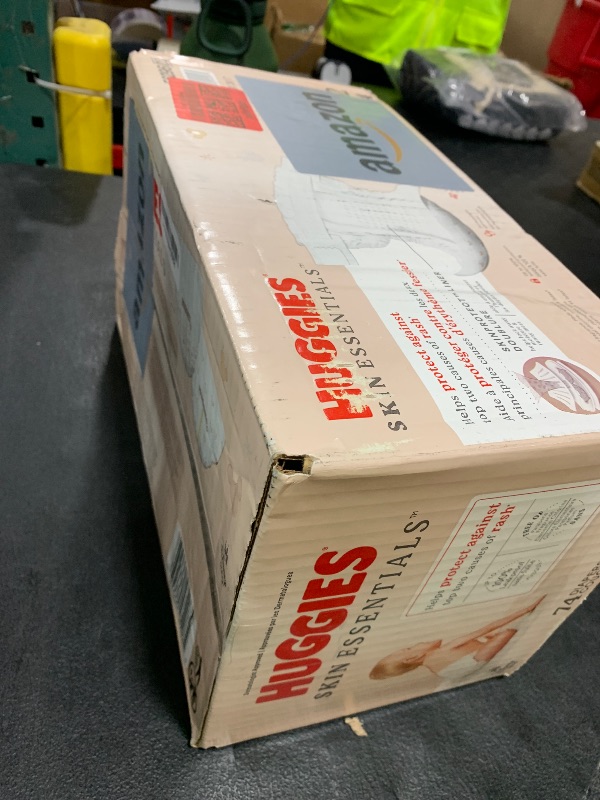 Photo 1 of Huggies Size 2 Diapers, Skin Essentials Baby Diapers, Size 2 (12-18 lbs), 74 Count, Packaging May Vary