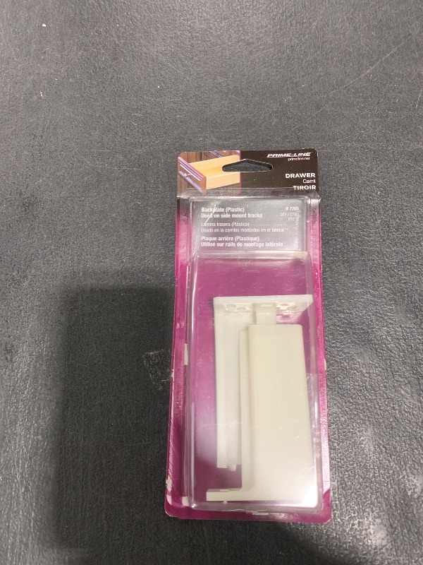 Photo 1 of Prime-Line R 7265 Drawer Track Back Plate, 3/8 In. x 1 In., Plastic, Off-White (1 Pair)