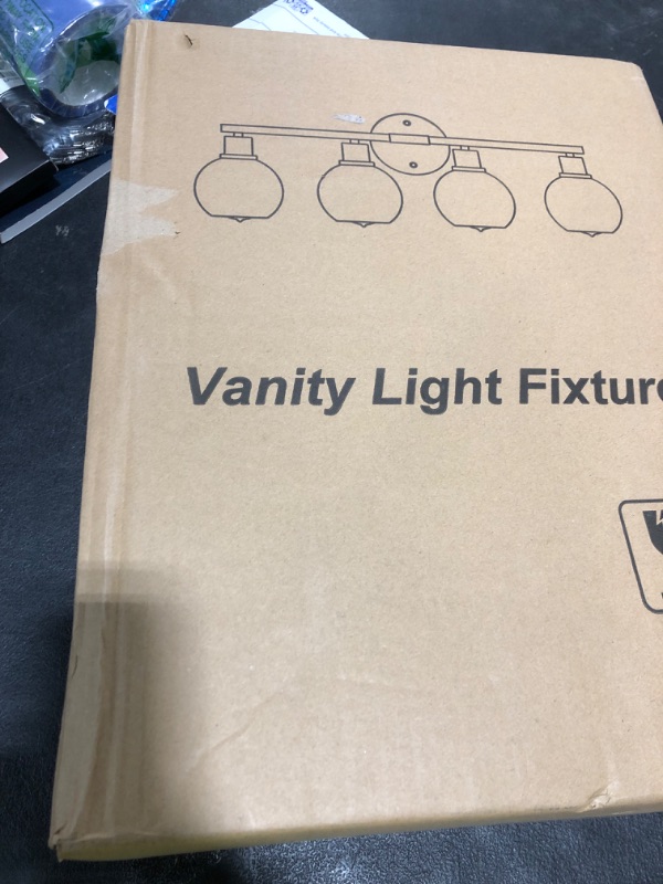 Photo 1 of Indoi 2025 Upgrade 4-Light Bathroom Light Fixtures, Black Bathroom Lights Over Mirror with Clear Glass Globe Shade, Vanity Lights for Bathroom Kitchen Living Room Hallway Cabinet Bedroom Porch