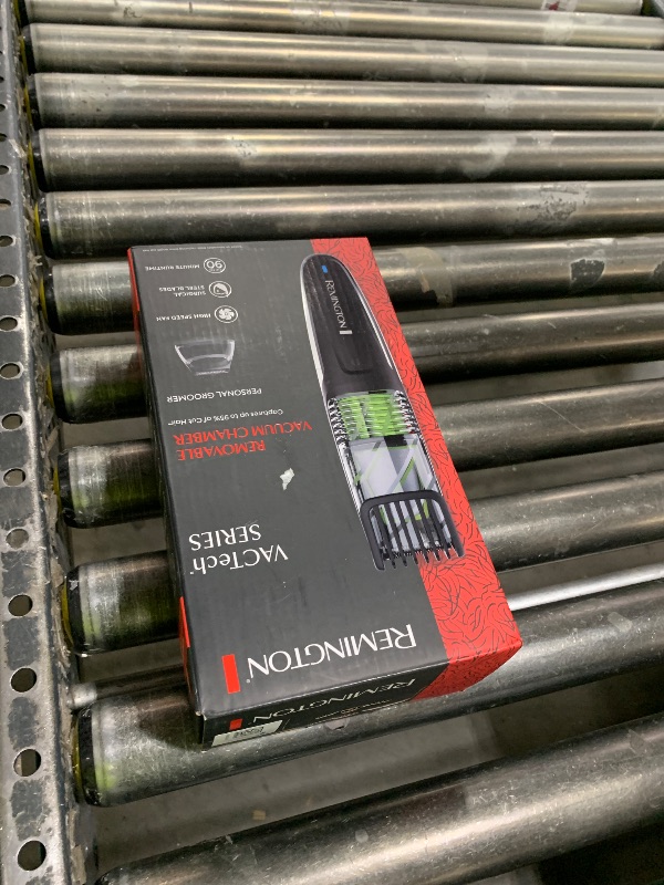 Photo 1 of Remington Vacuum Beard Trimmer,13 Length and Style Settings with Adjustable Length Comb (2-18mm)