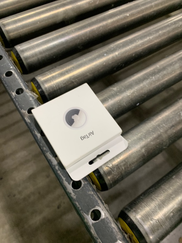 Photo 1 of Apple AirTag. Keep Track of and find Your Keys, Wallet, Luggage, Backpack, and More. Simple one-tap Set up with iPhone or iPad
