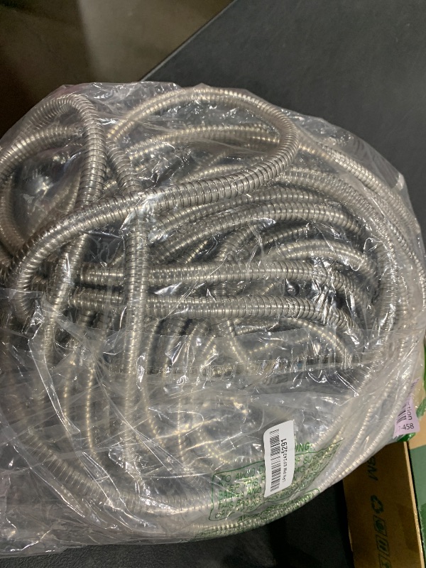 Photo 1 of TheFitLife Flexible Metal Garden Hose - Upgrade Leak and Fray Resistant Design, Stainless Steel Water Hose with Solid Fittings and Sprayer Nozzle, Lightweight Kink Free Durable Easy Storage (75 FT)