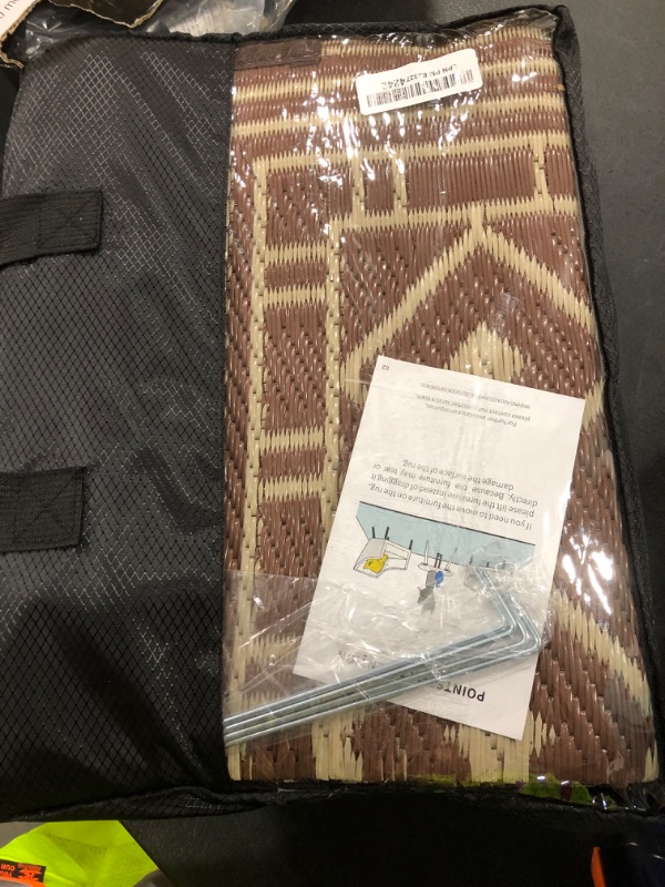 Photo 1 of GENIMO Outdoor Rug Waterproof for Patio Decor, 5'x8' Reversible Plastic Straw Rug Carpet, Camping Mat for Outdoor, RV, Backyard, Deck, Balcony, Picnic, Beach, Coffee & Beige