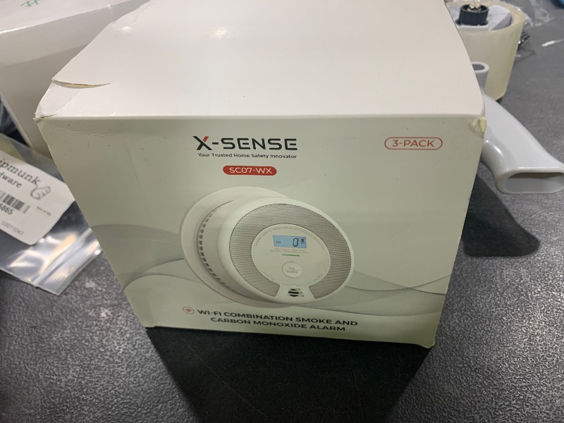 Photo 1 of X-Sense Smart Smoke Detector Carbon Monoxide Detector Combo with Replaceable Battery, Wi-Fi Smoke and Carbon Monoxide Detector with Real-Time App Notifications, SC07-WX, 3-Pack