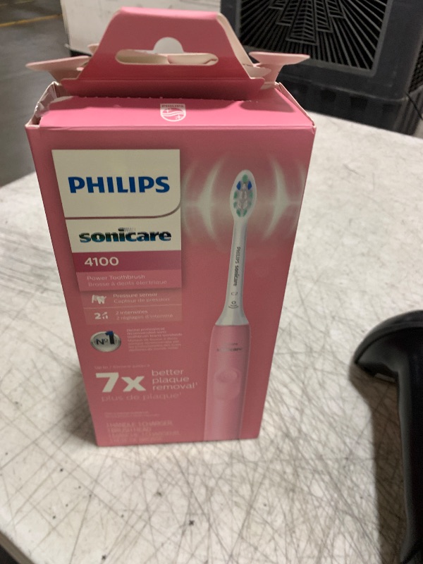 Photo 1 of Philips Sonicare 4100 Rechargeable Electric Toothbrush, with Pressure Sensor, 2 Intensity Settings, SmarTimer and QuadPacer, 14-Day Battery Life, Deep Pink, Model HX3681/26