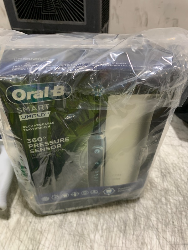 Photo 1 of Oral-B Pro Smart Limited Power Rechargeable Electric Toothbrush with (2) Brush Heads and Travel Case, Black