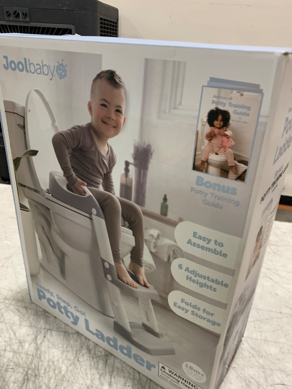 Photo 1 of Jool Baby Potty Training Seat with 2 Step Ladder for Toddlers - Soft Cushioned Seat & Splash Guard, Adjustable Height (Gray)