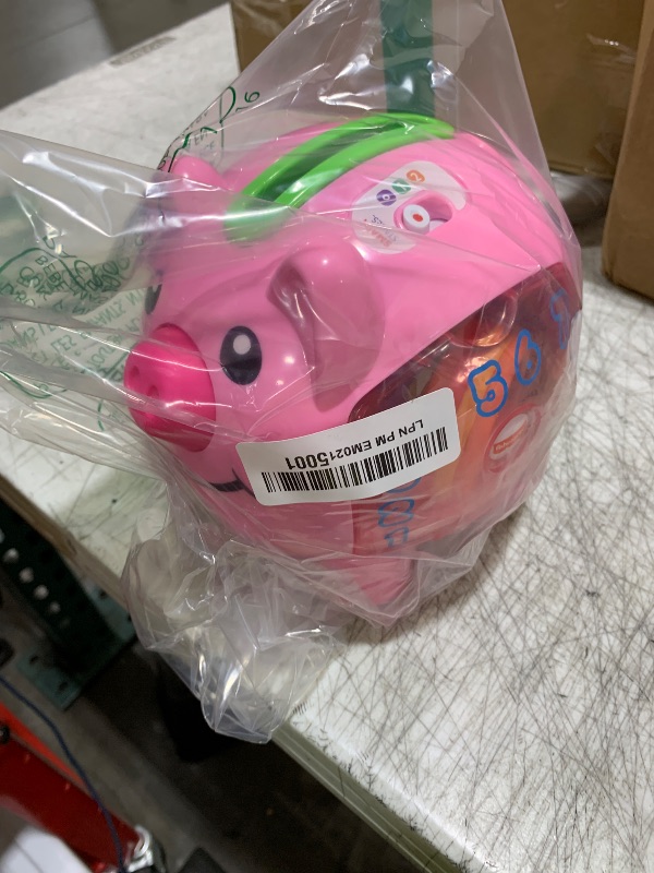 Photo 1 of Fisher-Price Baby & Toddler Toy Laugh & Learn Smart Stages Piggy Bank with Educational Songs & Phrases for Infants Ages 6+ Months