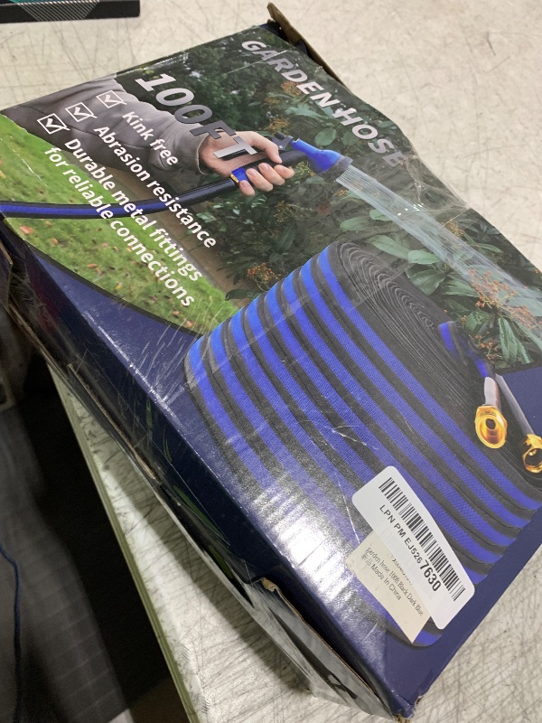Photo 1 of Toolasin Garden Hose 100ft, Non-Expanding, Lightweight, Leak-Proof Metal interface, No-Knots, Portable, Wear-Resistant, Sturdy, Flexible, Water Hose for Yard, Garden, Black Dark Blue